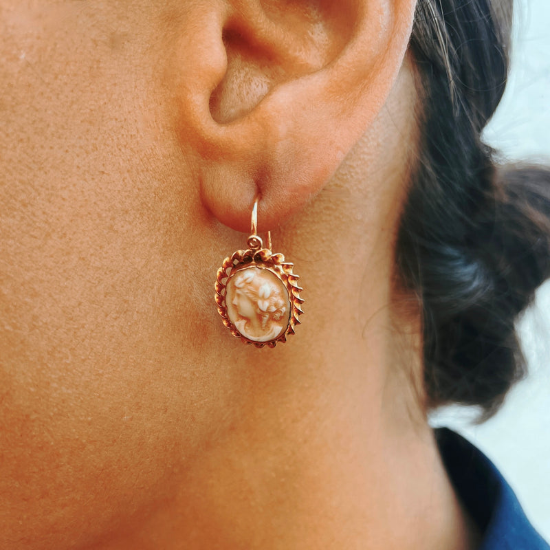 Antique cameo earrings worn by model