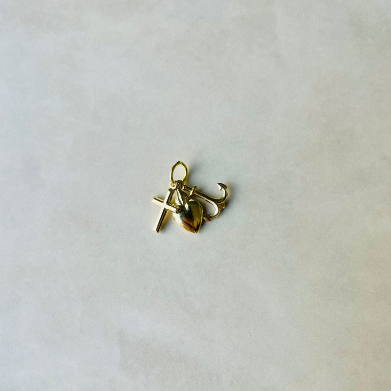 Gold pendant with cross and anchor on a white background | Deheb Jewellery Malta