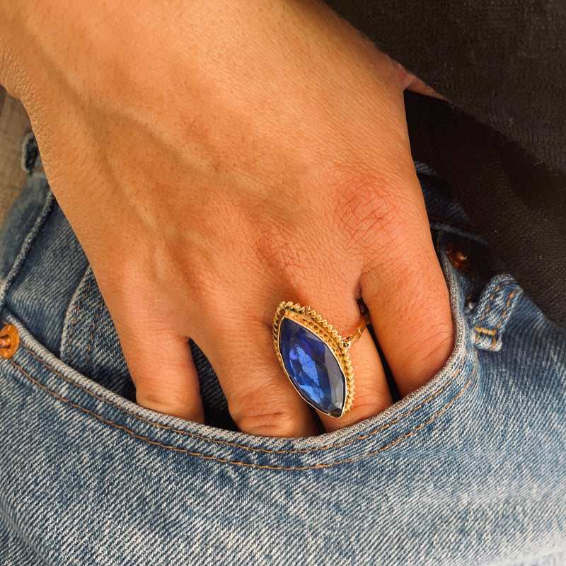 Large blue stone ring on model