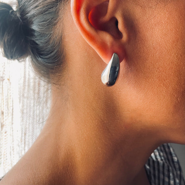 Silver tear drop stud earring