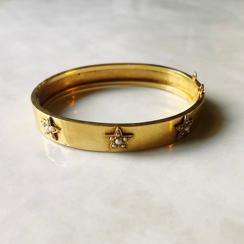 Star pearl bangle shot on surface