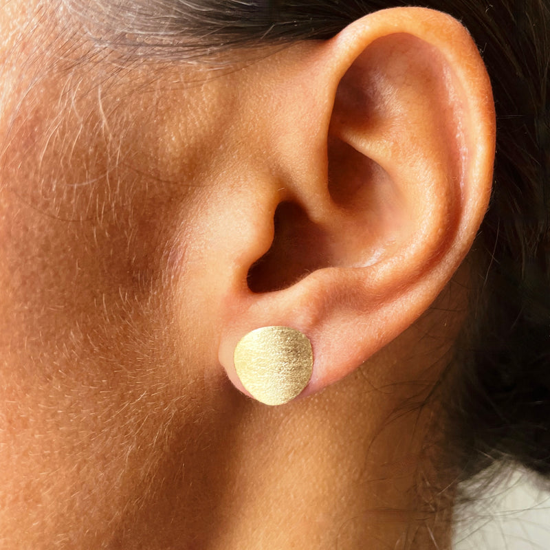 matt stud earrings worn on model 