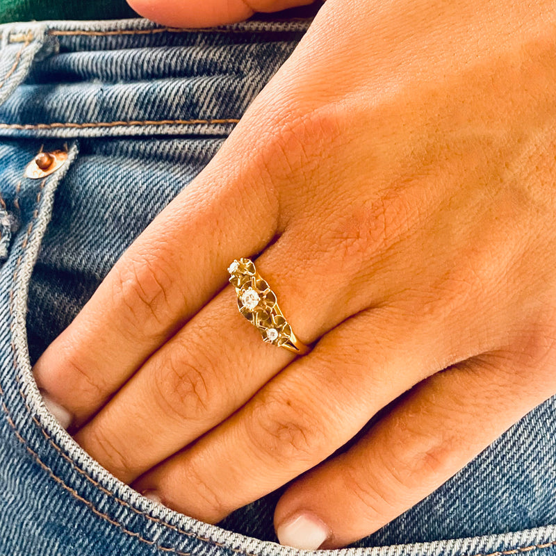 Trilogy diamond ring worn on model