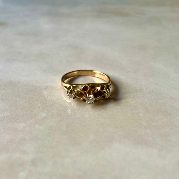 Trilogy ring shot on surface 